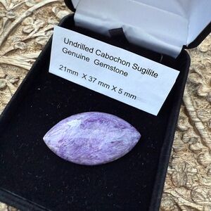 Undrilled cabochon sugilite stone